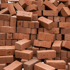 Obraz premium Realistic Photo Of Stacked Red Bricks With Textured Surface In Abstract Pattern