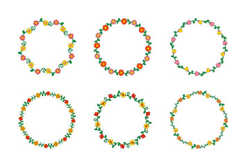Cute round floral frames with colorful flowers and green leaves set. Hand drawn botanical wreaths in simple playful style. Decorative borders for kids invitations, cards, scrapbooking, posters.
