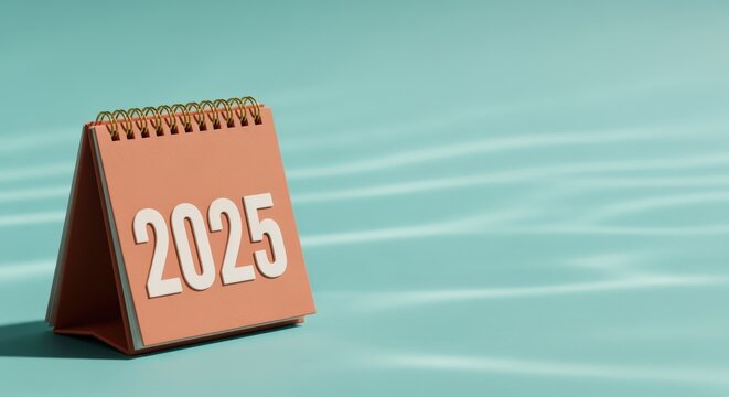 Desk Calendar Displaying 2025 on Turquoise Background, Symbolizing Upcoming Year, Planning, and Future