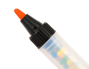 A vibrant orange marker tip protruding from a clear container filled with colorful caps, set against a solid black background.