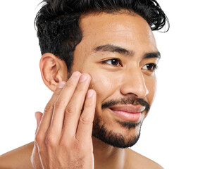 Obraz premium A close-up of a man gently touching his face, highlighting skincare and personal grooming on a dark background.