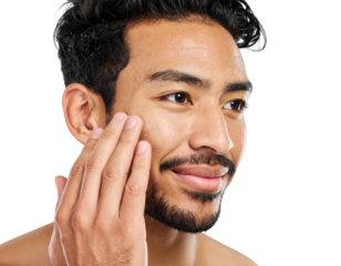 A close-up of a man gently touching his face, highlighting skincare and personal grooming on a dark background.
