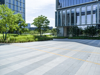 brick floor with modern office building © zhu difeng