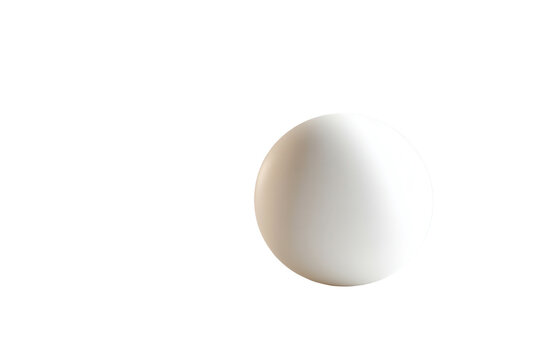 White ping pong ball rolling on a textured surface with a checkered pattern in a well-lit environment creating a dynamic and engaging visual of a common sports accessory