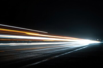 Dynamic night city road with brilliant light trails showcasing fast-moving vehicles and illuminated surroundings