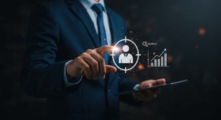 Businessman targets customer with digital analytics and growth charts