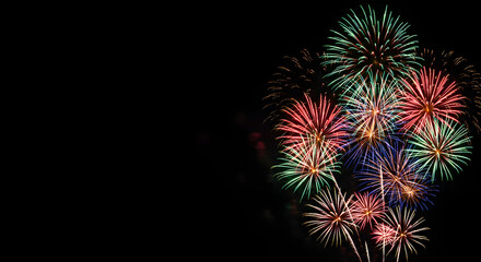 Cluster of fireworks with green and red bursts, AI generated	