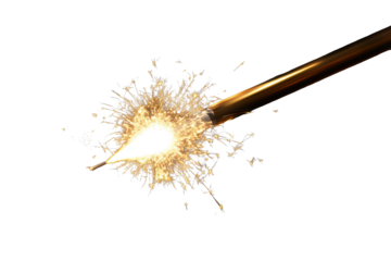 Bright sparkler light display creating dazzling effects at a festive celebration during nighttime gathering