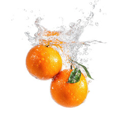 Two oranges in a splash of water