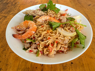 Thai spicy salad with mama noodles, Vietnamese sausage, minced pork and shrimps