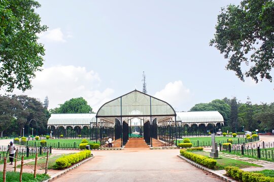 The Lalbagh Glass House, Bangalore, India, features a variety of tropical flora. A Victorian-style greenhouse, it represents a significant piece of historic architecture.