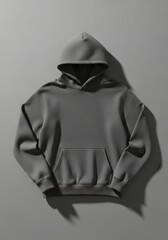 A charcoal gray hoodie, flatly laid, showcasing its design details and texture.