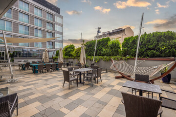 Outdoor terrace with seating and hammock view