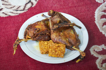 Fried Duck with Green Chili Sambal, captured on August 12, 2025. Crispy fried duck served with spicy green chili sambal, fresh vegetables, and steamed rice on a traditional plate.