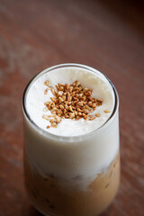 Praline Cookies Coffee, captured on August 12, 2025. Creamy espresso infused with nutty praline flavor, topped with whipped cream and served alongside crunchy cookies in a cozy setting.