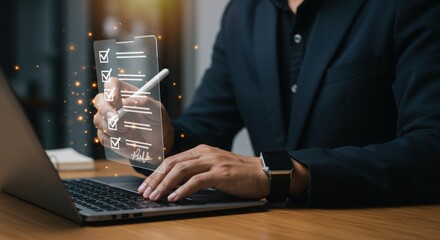 Business professional interacting with digital data on a transparent screen