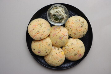 Rava Idli or semolina idli, Indian Breakfast Dish made with semolina, yogurt, spices, veggies,Traditional South Indian Breakfast, healthy vegetarian meal