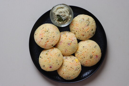 Rava Idli or semolina idli, Indian Breakfast Dish made with semolina, yogurt, spices, veggies,Traditional South Indian Breakfast, healthy vegetarian meal