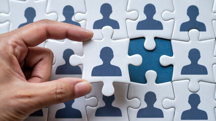 Human Resources and Talent Acquisition Concept Hand Placing Puzzle Piece Finding the Right Candidate for the Job Completing the Team