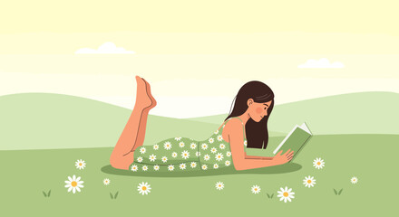 A young woman reading book lying on a grass field surrounded by flowers with a peaceful and relaxing ambience