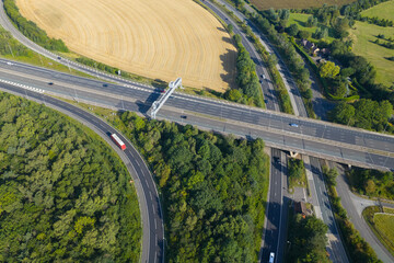 Aerial close-up view of Croft Interchange (Junction 21A) near Birchwood, showing curved slip roads, motorway bridges © bardhok
