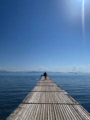 Wooden pier leading into the sea