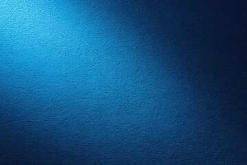 Deep blue textured surface with a light spotlight
