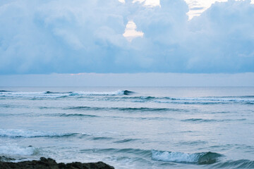 Calm Seascape with Rolling Waves and Cloudy Sky