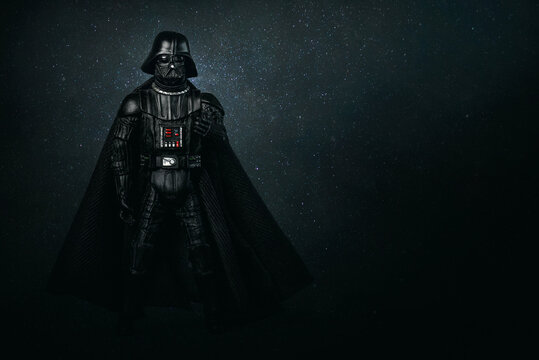Darth Vader action figure character from the Star Wars movie saga and space for text. Illustrative editorial