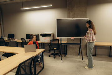 Team Collaboration in Modern Office With Interactive Presentation