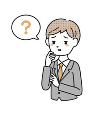 悩むスーツを着た男性