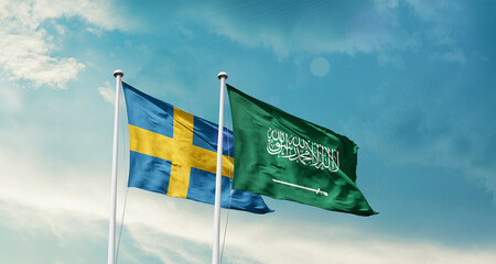 Sweden and Saudi Arabia friendship flags are waving in the sky. Two country flag for agreement or deal. Sweden KSA national flag for commitment.