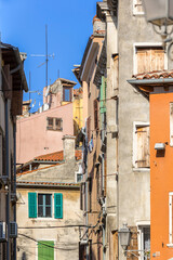 Fototapeta premium Rovinj, Croatia street with traditional buildings in historic old town