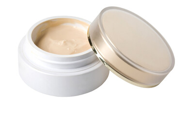 Opened jar of foundation cream showing its texture on white background