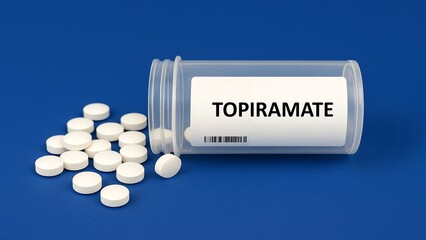 Box of TOPIRAMATE tablets placed on a hospital pharmacy table used for symptom relief and therapy, a therapeutic agent.