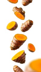 Fresh turmeric root and slices falling isolated on white background healthy spice food