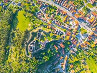 Explore the fascinating ruins of Rabi Castle located in Czechia, surrounded by scenic hills and a charming village, providing a glimpse into its historical significance and architecture.
