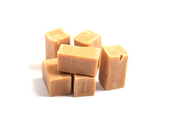 caramel candy close up on white background,