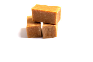 caramel candy close up on white background,