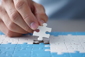 Completing jigsaw puzzle concept of strategy solution and business connection game
