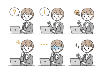 パソコンを使うスーツを着た女性