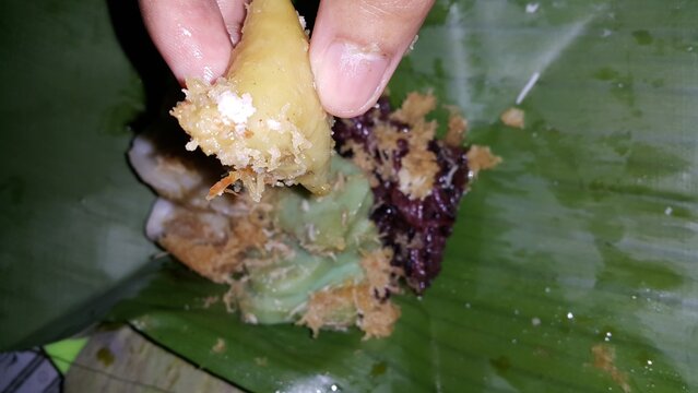 A shot of Lupis cake, a traditional Indonesian food. Selective Focus.