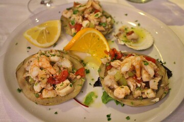 Italian cuisine: seafood salad with artichokes in Venice, Italy
