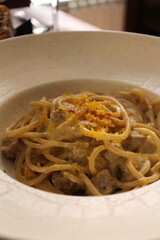 Italian cuisine: spaghetti with fish carbonara in Venice, Italy