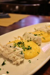 Italian cuisine: baccalà (dried and salted cod) with polenta in Venice, Italy