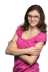 Beautiful brunette girl in round glasses in a t-shirt with crossed arms smiling on a white background