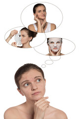 Young girl with acne thinking about mask for skin health on white background