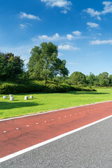 New pathway and beautiful trees track for running or walking and cycling relax in the park