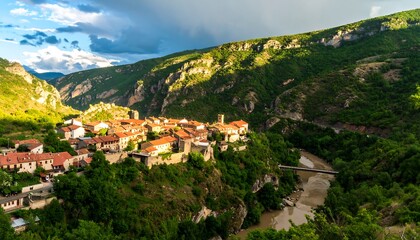 Obraz premium Picturesque mountain village nestled in a valley.