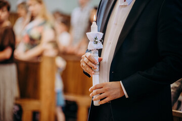 Chrzest święty, zbliżenie na świece